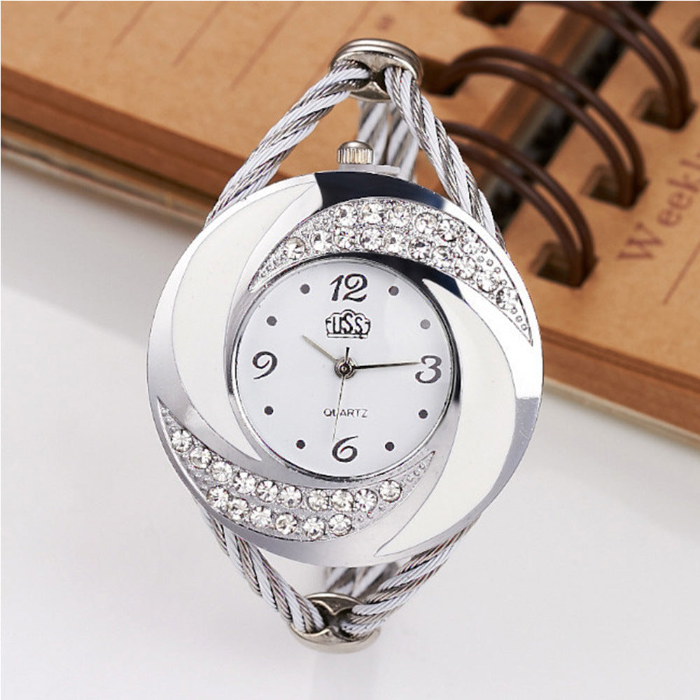 Diamond bracelet with braided watch