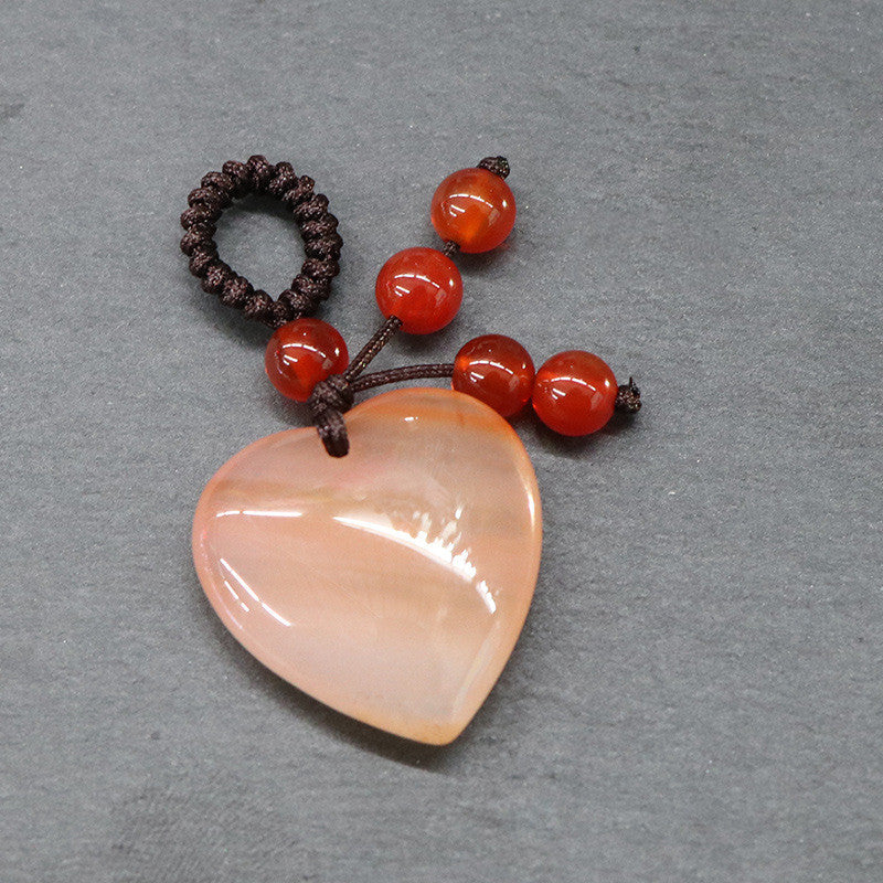 Various natural stone heart pendants